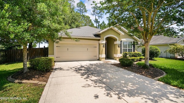 1804 Ferncreek Dr, Saint Augustine, FL 32092 - ranch-style house with stucco siding, a garage, and driveway