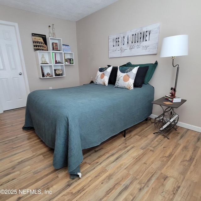 5201 Atlantic Blvd Unit 68, Jacksonville, FL 32207 - bedroom with wood finished floors and baseboards