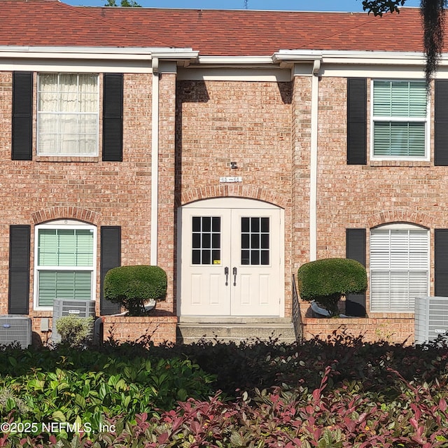 5201 Atlantic Blvd Unit 68, Jacksonville, FL 32207 - view of front of house featuring brick siding and cooling unit