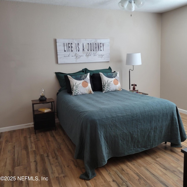 5201 Atlantic Blvd Unit 68, Jacksonville, FL 32207 - bedroom with wood finished floors and baseboards
