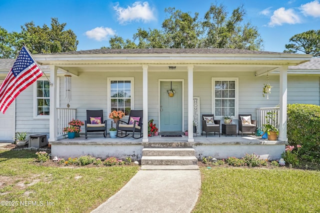 1537 Elmar Rd, Jacksonville, FL 32226 - bungalow-style house with covered porch, a front lawn, and roof with shingles