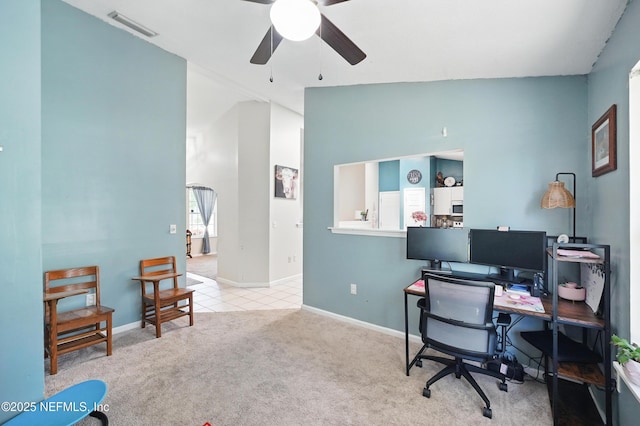 1537 Elmar Rd, Jacksonville, FL 32226 - carpeted office space with ceiling fan, tile patterned floors, baseboards, and vaulted ceiling
