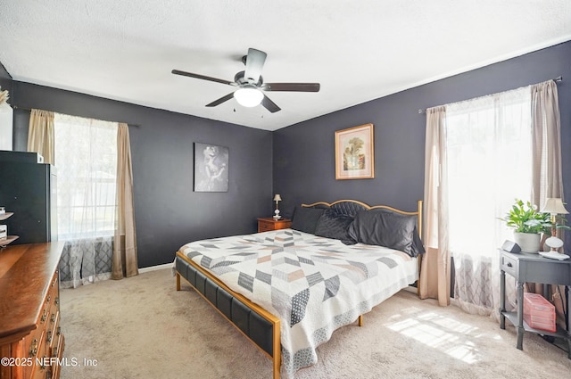 1537 Elmar Rd, Jacksonville, FL 32226 - bedroom with multiple windows, carpet flooring, ceiling fan, and baseboards