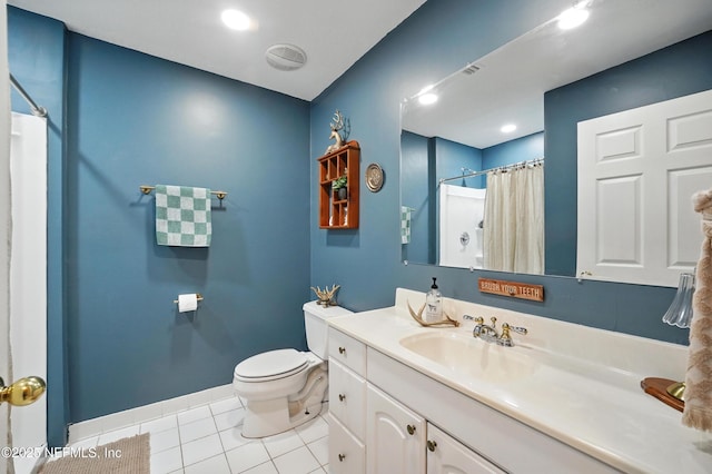 1537 Elmar Rd, Jacksonville, FL 32226 - full bath featuring toilet, vanity, tile patterned flooring, a shower with curtain, and baseboards