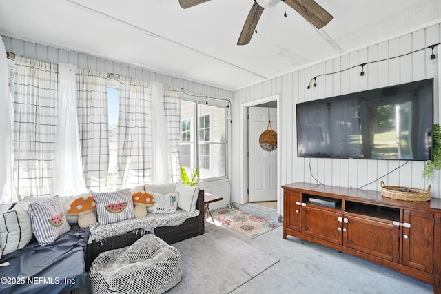 1537 Elmar Rd, Jacksonville, FL 32226 - living room with ceiling fan and light carpet