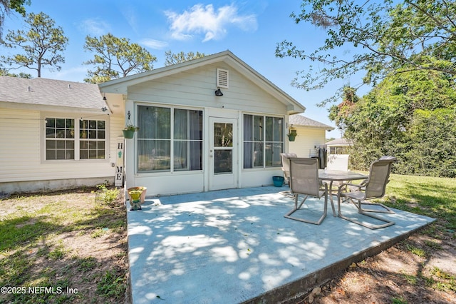 1537 Elmar Rd, Jacksonville, FL 32226 - rear view of house featuring a patio and outdoor dining space