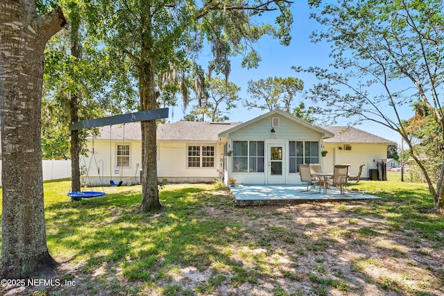 1537 Elmar Rd, Jacksonville, FL 32226 - back of house featuring a sunroom and a shingled roof