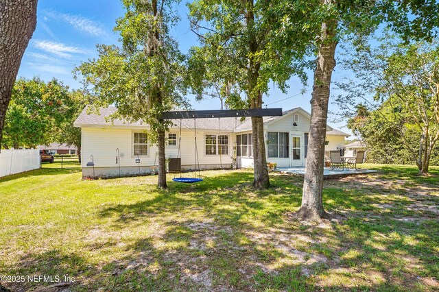 1537 Elmar Rd, Jacksonville, FL 32226 - back of house featuring a sunroom and central air condition unit