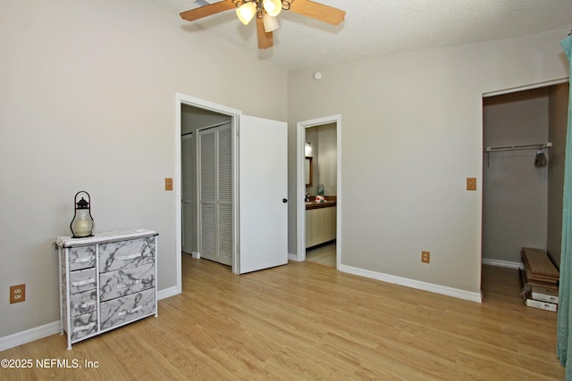 2105 Sandpiper Ct, Ponte Vedra Beach, FL 32082 - unfurnished bedroom with light wood-style flooring, a walk in closet, a closet, baseboards, and ensuite bathroom