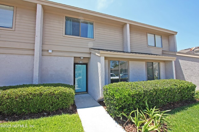 2105 Sandpiper Ct, Ponte Vedra Beach, FL 32082 - doorway to property with stucco siding