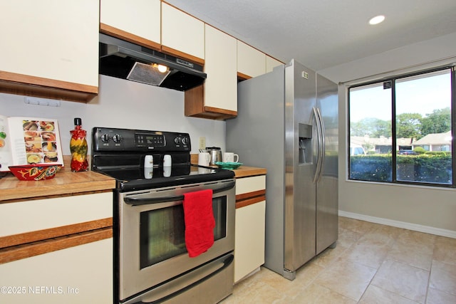 2105 Sandpiper Ct, Ponte Vedra Beach, FL 32082 - kitchen with stainless steel appliances, extractor fan, white cabinetry, light countertops, and recessed lighting