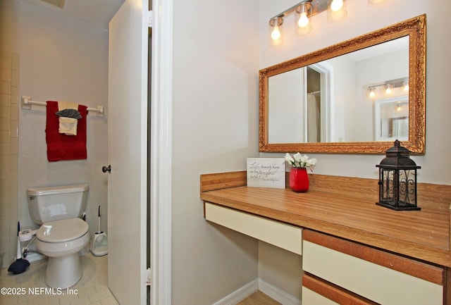 2105 Sandpiper Ct, Ponte Vedra Beach, FL 32082 - full bath featuring toilet, vanity, tile patterned floors, and baseboards