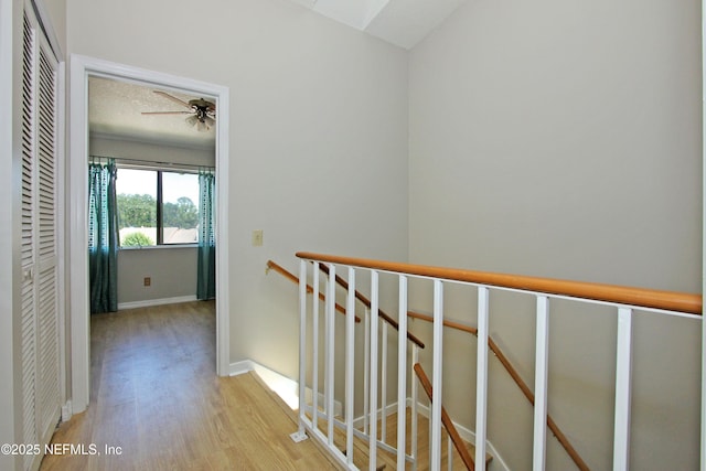 2105 Sandpiper Ct, Ponte Vedra Beach, FL 32082 - corridor featuring an upstairs landing, wood finished floors, and baseboards