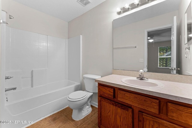 4778 Playpen Dr, Jacksonville, FL 32210 - bathroom featuring vanity, toilet, a ceiling fan, and  shower combination