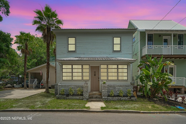119 Moore St, Saint Augustine, FL 32084 - view of front of home with entry steps and a balcony