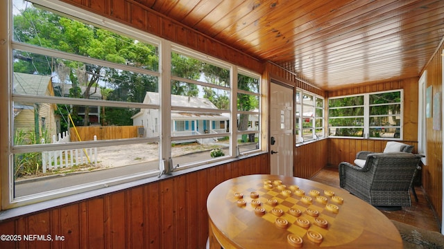 119 Moore St, Saint Augustine, FL 32084 - sunroom with wooden walls and wood ceiling