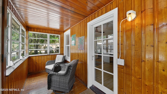 119 Moore St, Saint Augustine, FL 32084 - sunroom / solarium featuring wood walls, wood finished floors, and wooden ceiling