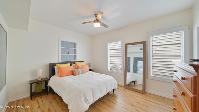 119 Moore St, Saint Augustine, FL 32084 - bedroom with light wood-type flooring, baseboards, and a ceiling fan