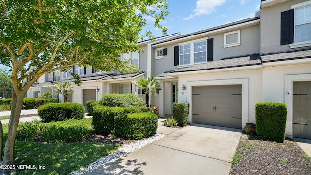 18 Amistad Dr, Saint Augustine, FL 32086 - multi unit property with stucco siding, a garage, and driveway