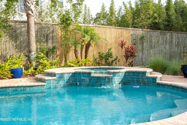 211 Tenth St, Saint Augustine, FL 32084 - view of swimming pool featuring a pool with connected hot tub