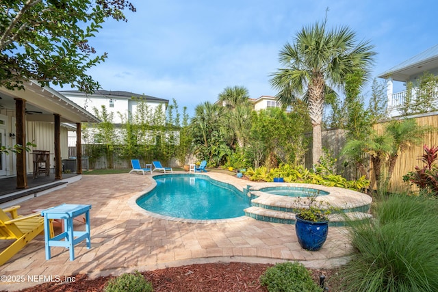 211 Tenth St, Saint Augustine, FL 32084 - view of swimming pool featuring a fenced backyard, a patio, and a pool with connected hot tub