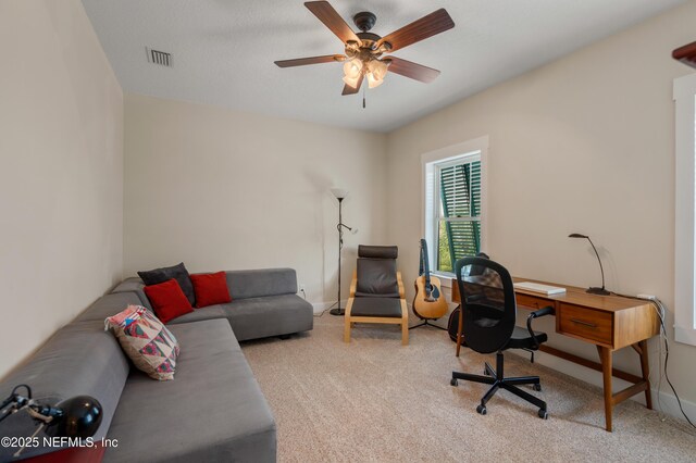 211 Tenth St, Saint Augustine, FL 32084 - home office featuring carpet, ceiling fan, and baseboards