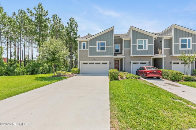 11286 Minnetta Ct, Jacksonville, FL 32256 - view of front facade with a garage, driveway, board and batten siding, and a front yard