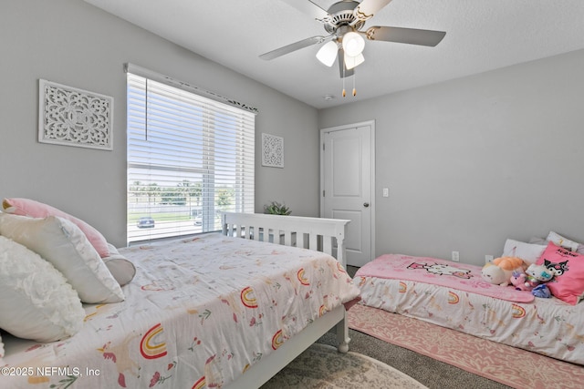 11286 Minnetta Ct, Jacksonville, FL 32256 - carpeted bedroom with multiple windows and a ceiling fan