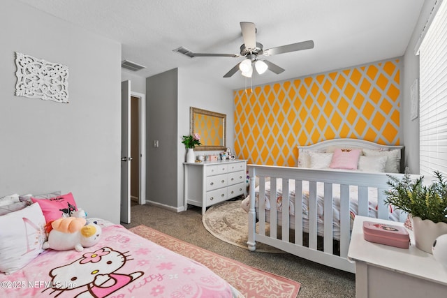 11286 Minnetta Ct, Jacksonville, FL 32256 - bedroom featuring an accent wall, carpet, baseboards, and a ceiling fan