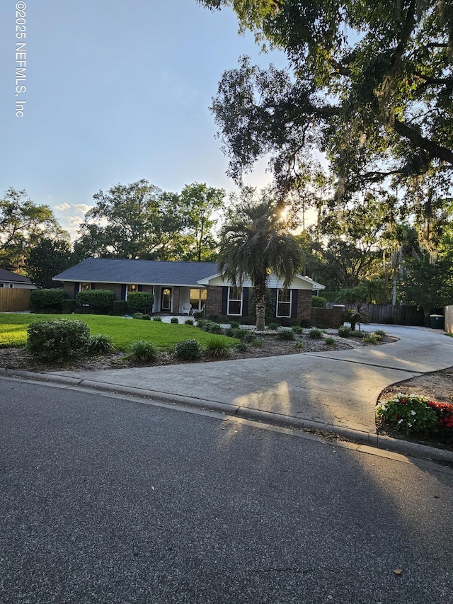 13150 Rivergate Ln, Jacksonville, FL 32223 - view of front of house with curved driveway