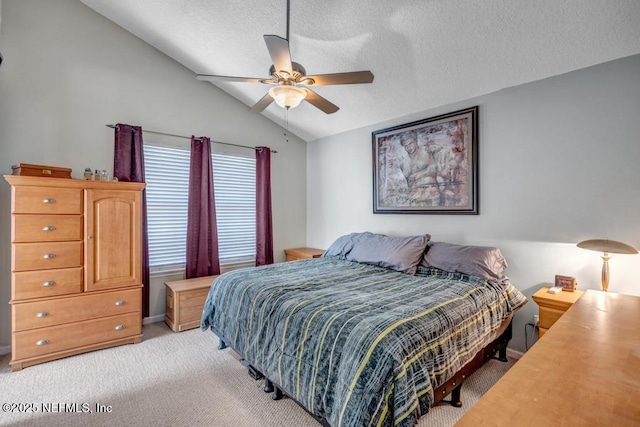 7041 Catlett Rd, Saint Augustine, FL 32095 - bedroom with light carpet, lofted ceiling, a textured ceiling, and a ceiling fan