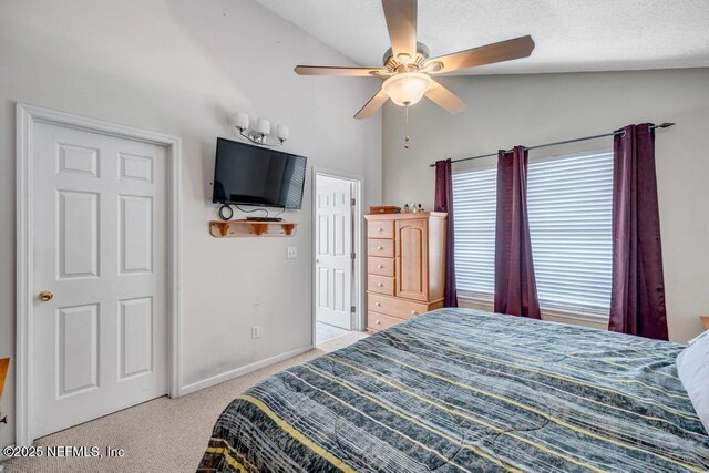 7041 Catlett Rd, Saint Augustine, FL 32095 - bedroom with vaulted ceiling, carpet, ceiling fan, and baseboards