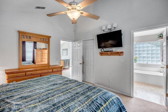 7041 Catlett Rd, Saint Augustine, FL 32095 - bedroom with lofted ceiling, ceiling fan, baseboards, and light carpet