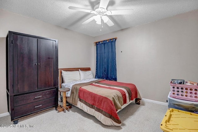 7041 Catlett Rd, Saint Augustine, FL 32095 - bedroom featuring a textured ceiling, carpet, baseboards, and a ceiling fan