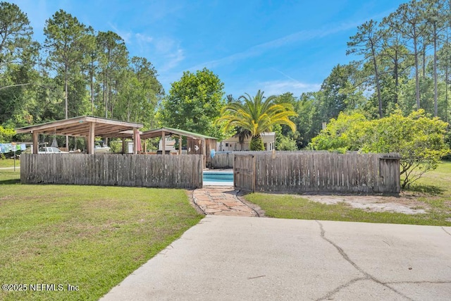 7041 Catlett Rd, Saint Augustine, FL 32095 - view of yard featuring a detached carport