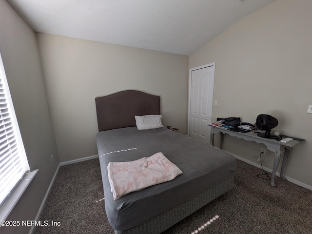 12429 Pecan Hickory Ct, Jacksonville, FL 32226 - carpeted bedroom with vaulted ceiling, baseboards, and a desk
