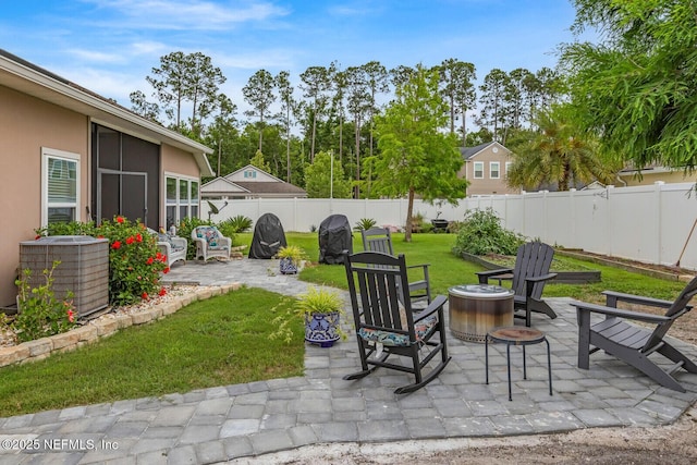 380 Crescent Key Dr, Saint Augustine, FL 32086 - view of patio / terrace featuring a fire pit and cooling unit