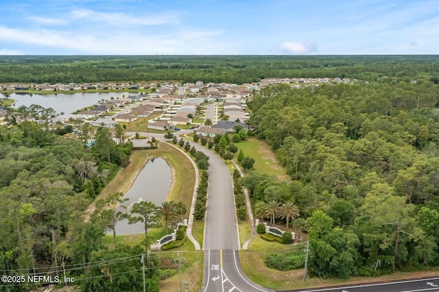 380 Crescent Key Dr, Saint Augustine, FL 32086 - view of property location with a heavily wooded area, a nearby body of water, and nearby suburban area