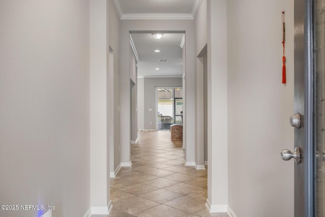 380 Crescent Key Dr, Saint Augustine, FL 32086 - hallway with crown molding, baseboards, and light tile patterned flooring