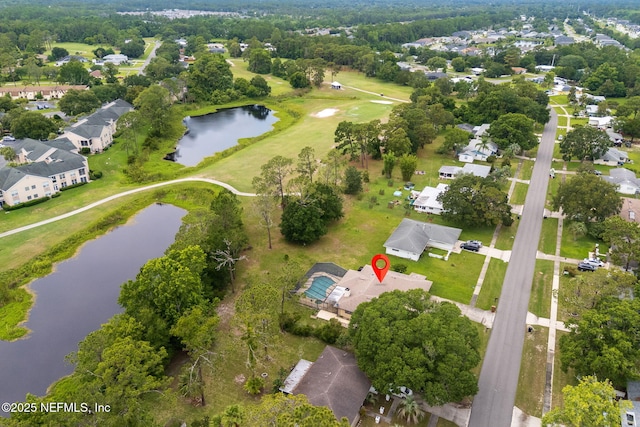 419 Sevilla Dr, Saint Augustine, FL 32086 - aerial view of property and surrounding area featuring a large body of water, nearby suburban area, and a golf course