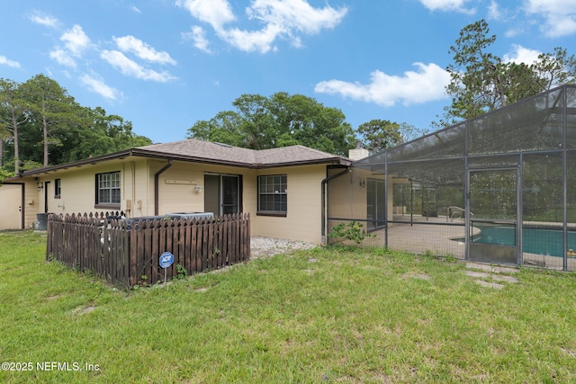 419 Sevilla Dr, Saint Augustine, FL 32086 - rear view of house with a lanai