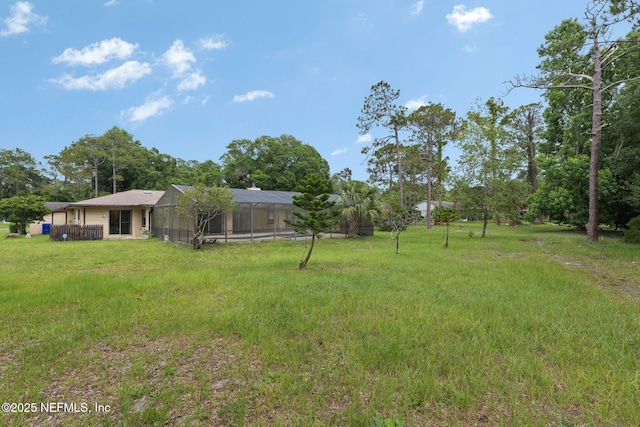 419 Sevilla Dr, Saint Augustine, FL 32086 - view of yard featuring a lanai