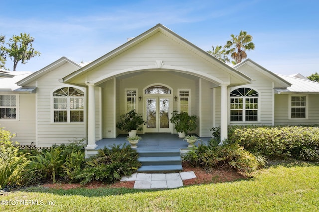 4333 Seminole St, Starke, FL 32091 - view of front of home featuring french doors and covered porch
