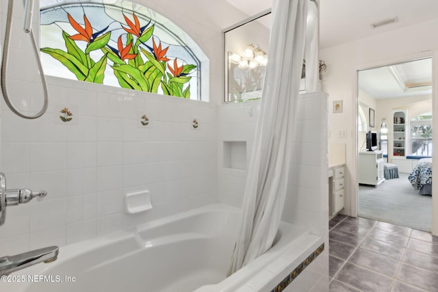 4333 Seminole St, Starke, FL 32091 - bathroom with tiled shower / bath combo, tile patterned flooring, and vanity