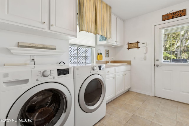4333 Seminole St, Starke, FL 32091 - washroom with washing machine and dryer, cabinet space, light tile patterned floors, and baseboards