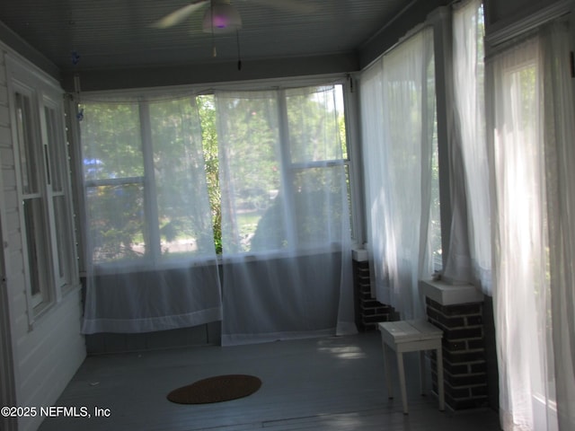 870 Allison St, Jacksonville, FL 32254 - unfurnished sunroom with a ceiling fan and healthy amount of natural light