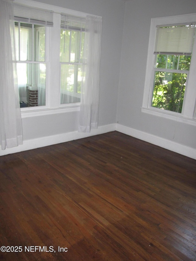 870 Allison St, Jacksonville, FL 32254 - unfurnished room featuring dark wood-type flooring and baseboards