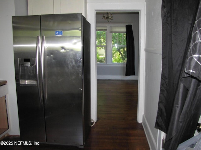 870 Allison St, Jacksonville, FL 32254 - kitchen featuring stainless steel refrigerator with ice dispenser, wood finished floors, and white cabinetry