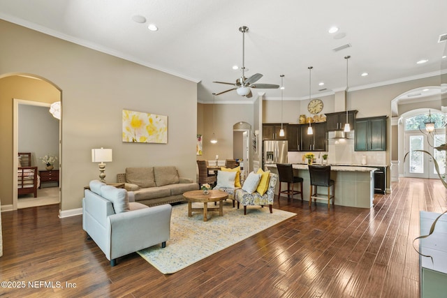 117 Pineta Way, Saint Johns, FL 32259 - living room with arched walkways, ceiling fan, recessed lighting, dark wood-style flooring, and ornamental molding