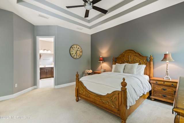 117 Pineta Way, Saint Johns, FL 32259 - bedroom with a tray ceiling, carpet, baseboards, ensuite bathroom, and ceiling fan